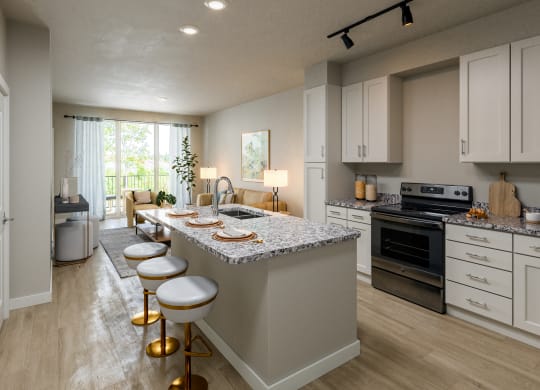 a kitchen with white cabinets and a large island with a granite countertop at Fairmont at South Lake, Bowie Maryland