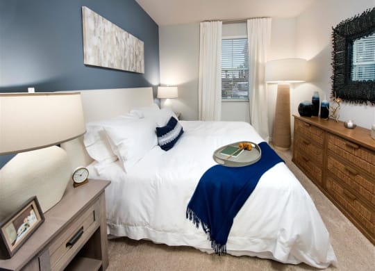 Bedroom With Expansive Windows at Town Trelago, Florida