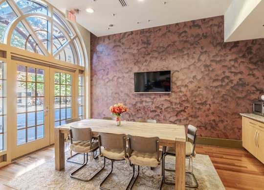 A dining room with a table set for four at Garfield Park, Arlington, 22201