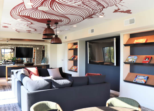 a living room filled with furniture and a flat screen tv at Vyne One Loudoun, Ashburn, Virginia