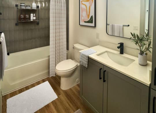 a bathroom with a sink and a toilet and a shower
