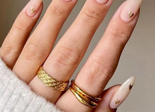 a clean white manicure with gold dots on nails at Allied Harbor Point, Baltimore, 21231