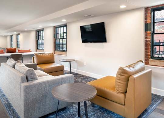 Community Room With TV at The Residences at St. Elizabeths East, Washington, DC, 20032