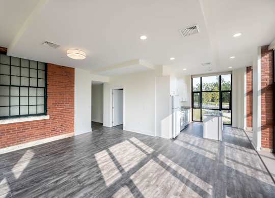 A spacious room with wooden floors at The Residences at St. Elizabeths East, Washington, DC 20032