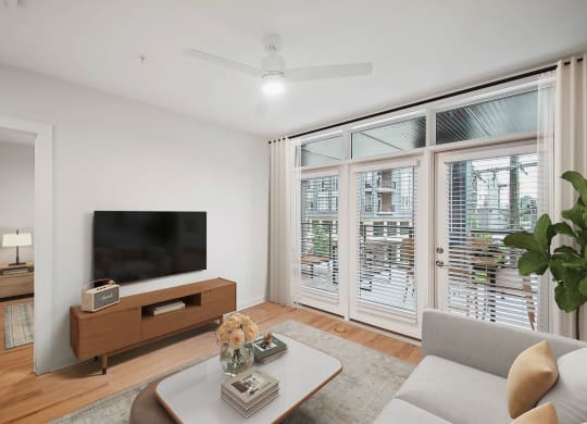 a living room with a couch and a table at Hawkins Press Apartments, Charlotte