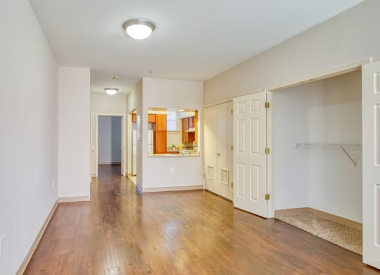 a renovated living room with a hard wood floor and white walls at North Market South Carroll, Maryland, 21701