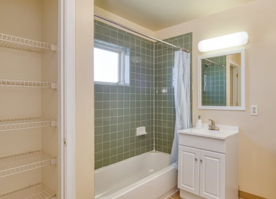 a bathroom with a toilet sink and a shower at North Market South Carroll, Frederick, MD 21701