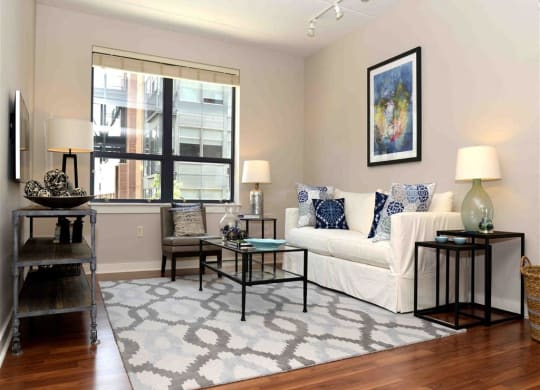 Couch and table in living room at The Gunther, Baltimore, Maryland