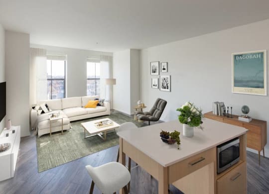 a living room and dining room with a couch and a table at Reed Row, Washington
