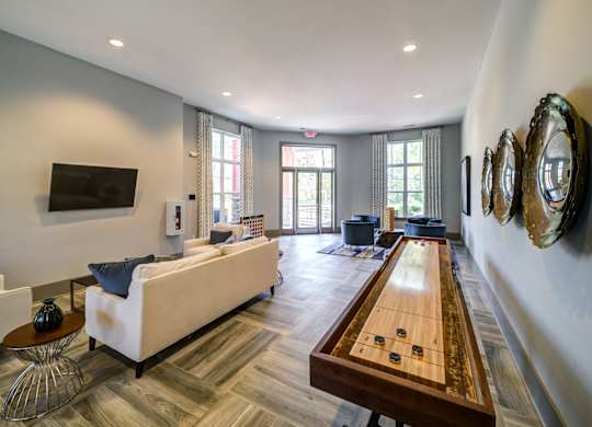 Clubroom With Shuffleboard at The Aster Cary, North Carolina