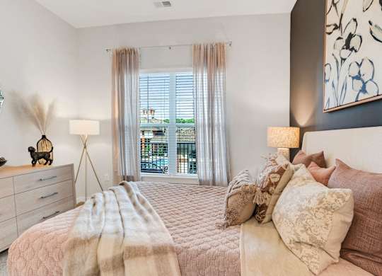 Bedroom With Expansive Window at The Aster Cary, North Carolina