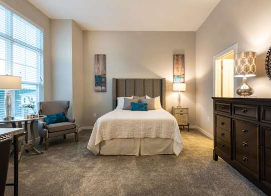 A Bedroom With a Dresser at The Aster Cary, Cary, 27519