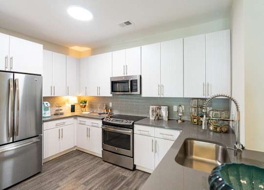 A Kitchen With White Cabinets at The Aster Cary, North Carolina, 27519