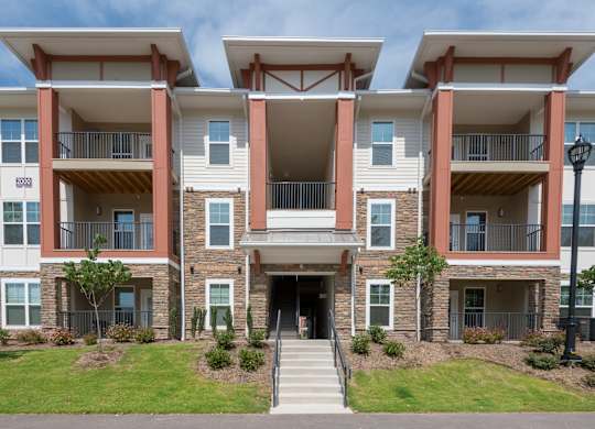 A Building With a Front Lawn at The Aster Cary, Cary, NC 27519