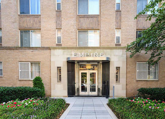 The front of a building with the word "Empire" written on it.