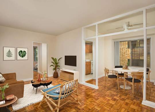 A living room with a brown chair and a brown couch.