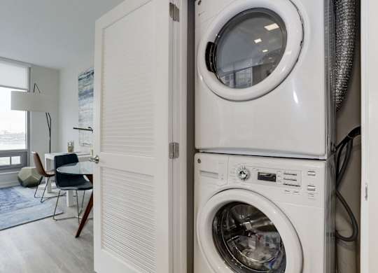 In unit washer and dryer laundry closet at 1405 Point Apartments, Baltimore, MD 21231
