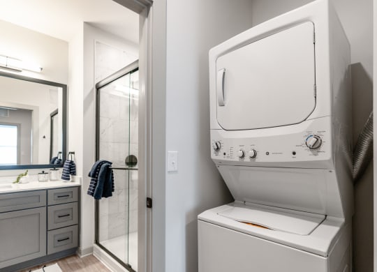 a washer and dryer in apartment at Preston Ridge Cary, NC