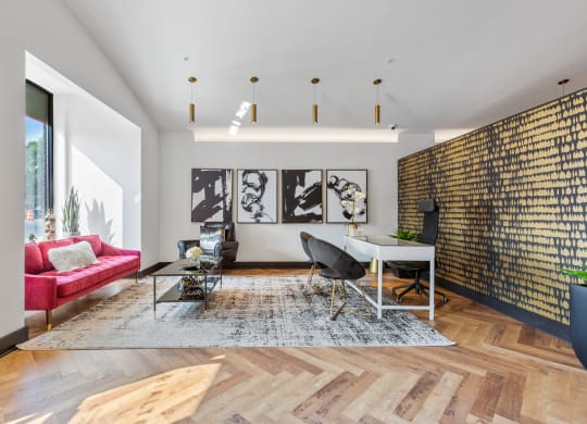 a living room with a white table and a red couch at Rialto, District of Columbia 