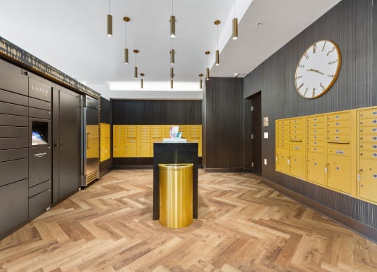 a locker room with yellow lockers and a clock on the wall at Rialto, District of Columbia, 20002