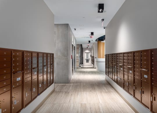 a long hallway with lockers in a building