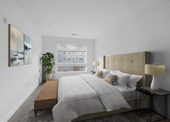 a bedroom with a large bed and a window at Fort Totten Square, Washington