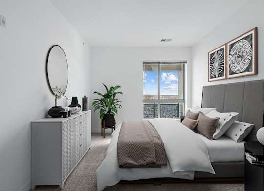 a bedroom with a large bed and a window at Fort Totten Square, Washington DC, 20011
