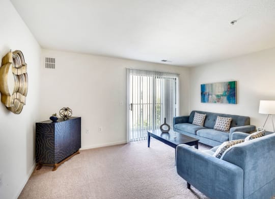 Living Room With Expansive Window at The Fields at Merrifield, Falls Church