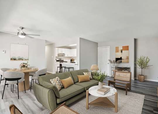 A living room with a green couch and a coffee table.