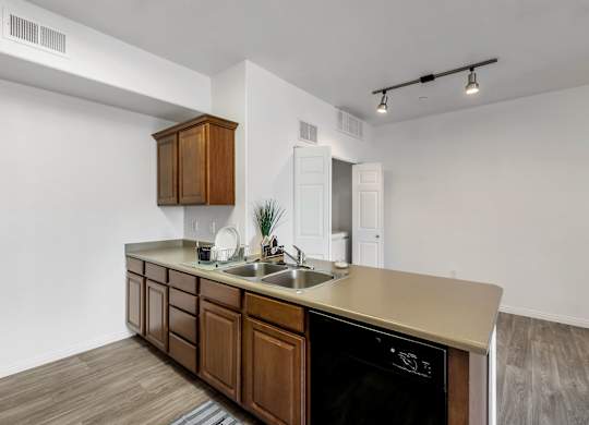 A kitchen with a wooden counter and a black oven.at Florentine Villas, Utah, 84047