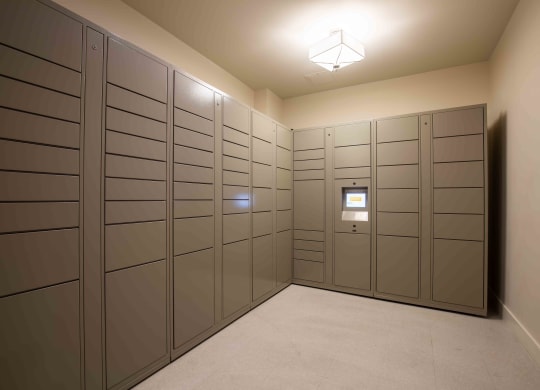 a row of lockers in a room with a light on at Woodmore Grand, Bowie