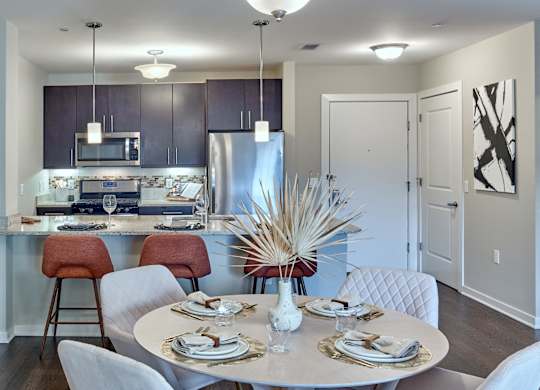 Open concept kitchen and dining area at Vermella Lyndhurst apartments, New Jersey