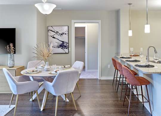 Open concept kitchen and dining area at Vermella Lyndhurst apartments, Lyndhurst, NJ