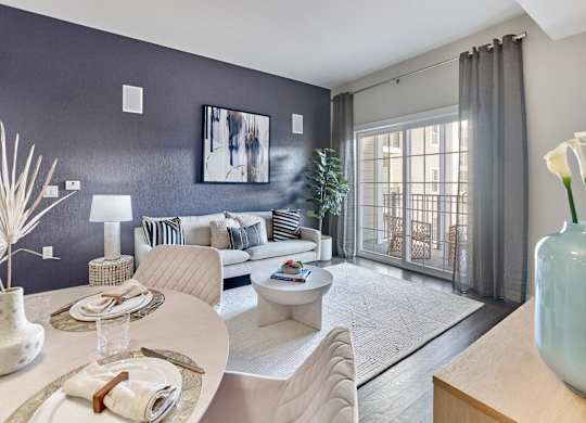 Spacious living room with large windows and private outdoor space at Vermella Lyndhurst apartments, Lyndhurst