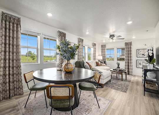 a living room with a table and a couch