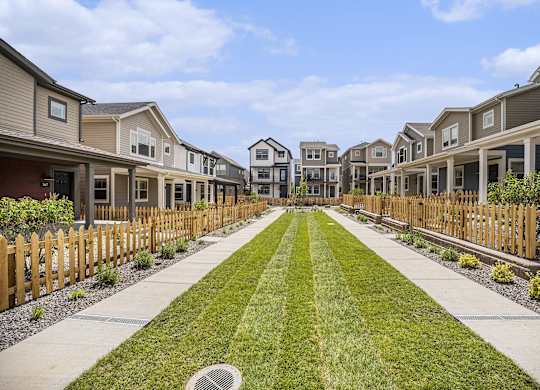 Fenced yards & individual porches.