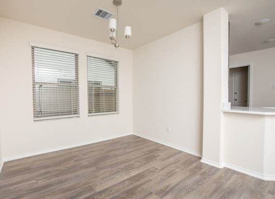 Living Area With Windows at The Village at Caney Mills, Conroe