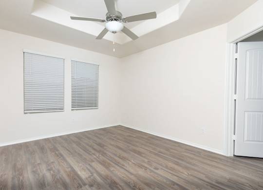 Wood Floor Living Room at The Village at Caney Mills, Texas, 77303