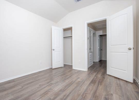 Unfurnished Bedroom And Hallway at The Village at Caney Mills, Conroe, 77303