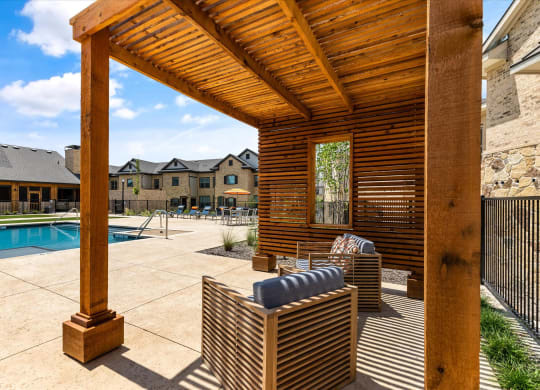 relax at the pool under the pergola