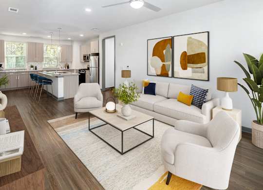 A modern living room with a white sofa, a coffee table, and a painting on the wall.