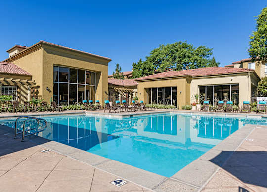 A large swimming pool Legacy Apartments