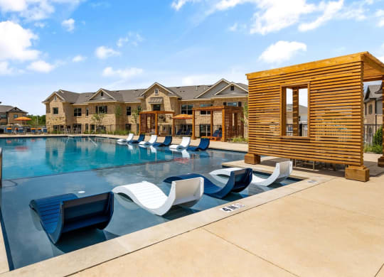 take a dip in the resort style pool at villas at Emerson at Red Oak apartments
