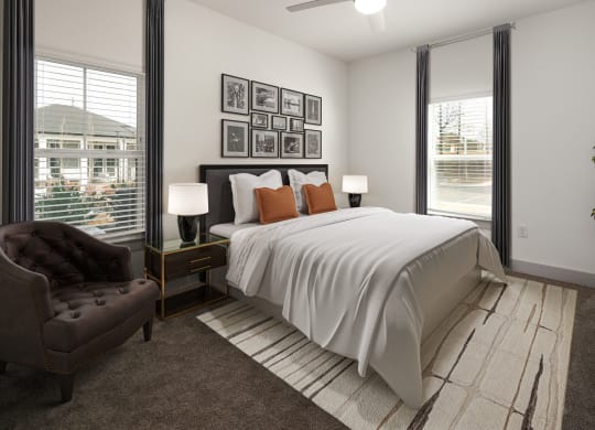 a bedroom with a bed and a chair