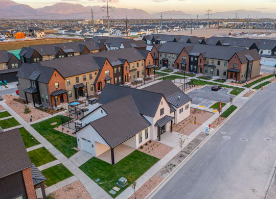 an aerial view of a group of houses in a neighborhood