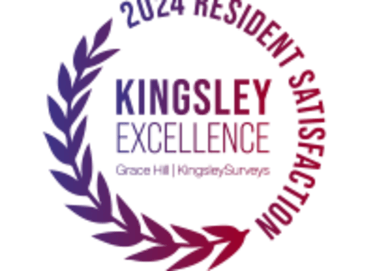 a circle with the words kingsley excellence on a green background