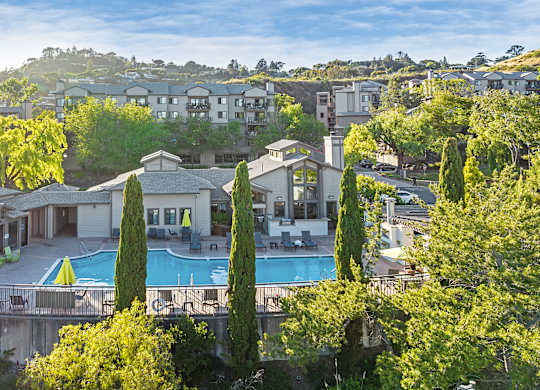 a view of the pool at the resort at napoleonoleon apartments and villas