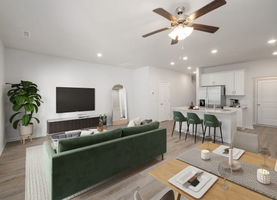 a living room with a couch and a table with chairs