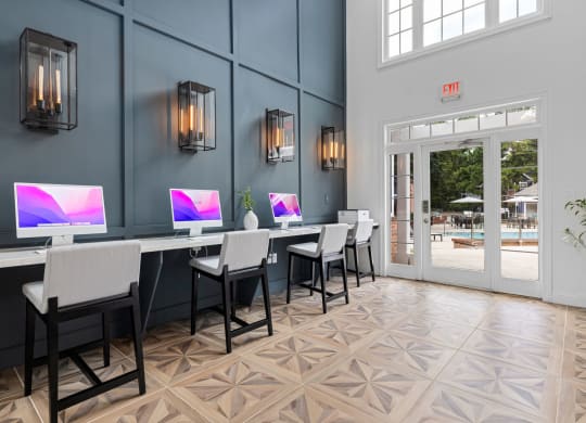 a conference room with computers on tables and chairs at Mariners Crossing, North Carolina