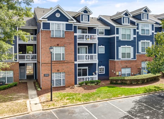 exterior view of select apartments at the grove at waterford place in waterford at Mariners Crossing, Raleigh